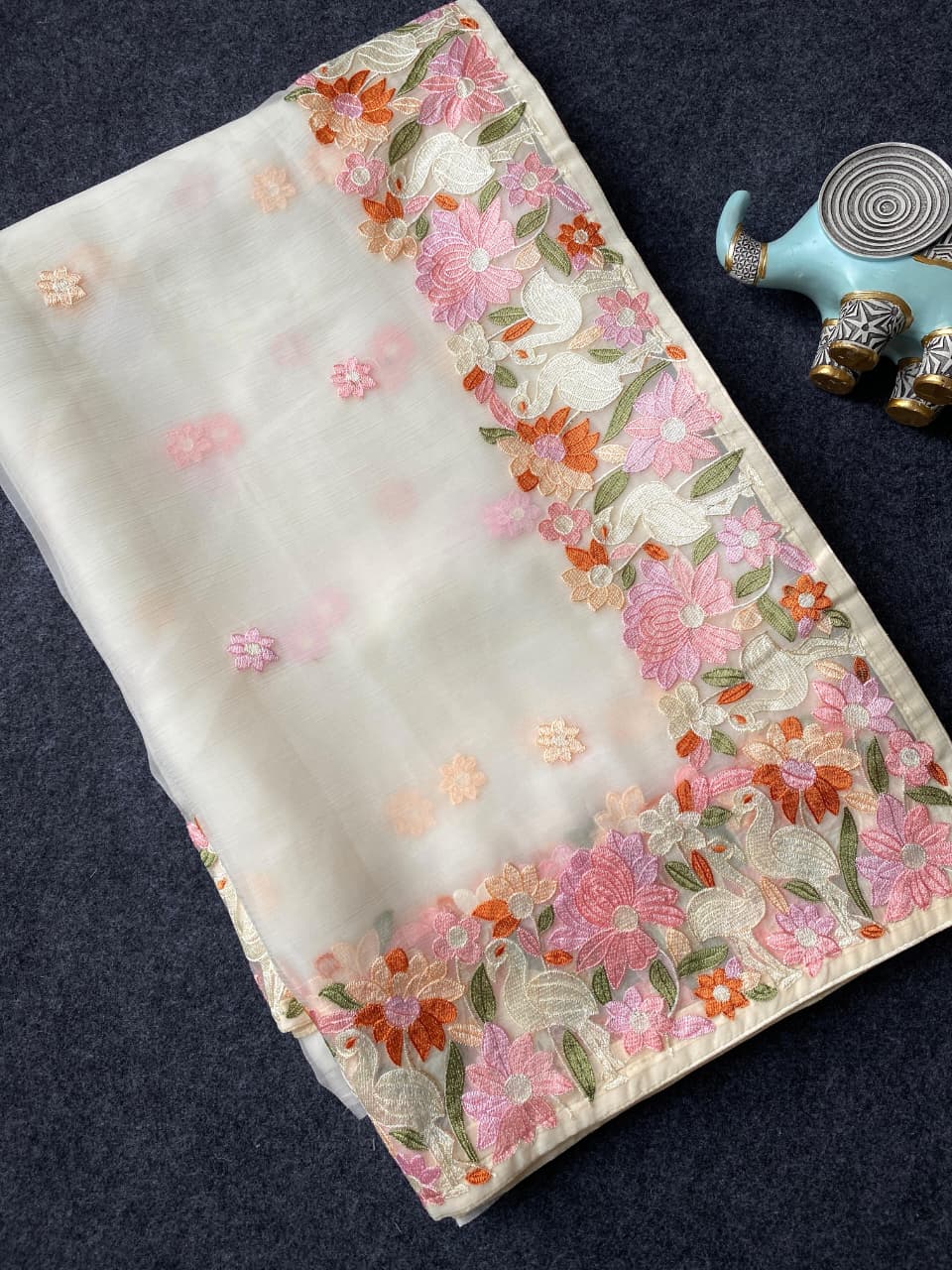 Surpassing Off White Embroidery Work Chiffon Silk Saree With Staring Blouse Piece