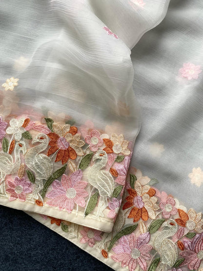 Surpassing Off White Embroidery Work Chiffon Silk Saree With Staring Blouse Piece