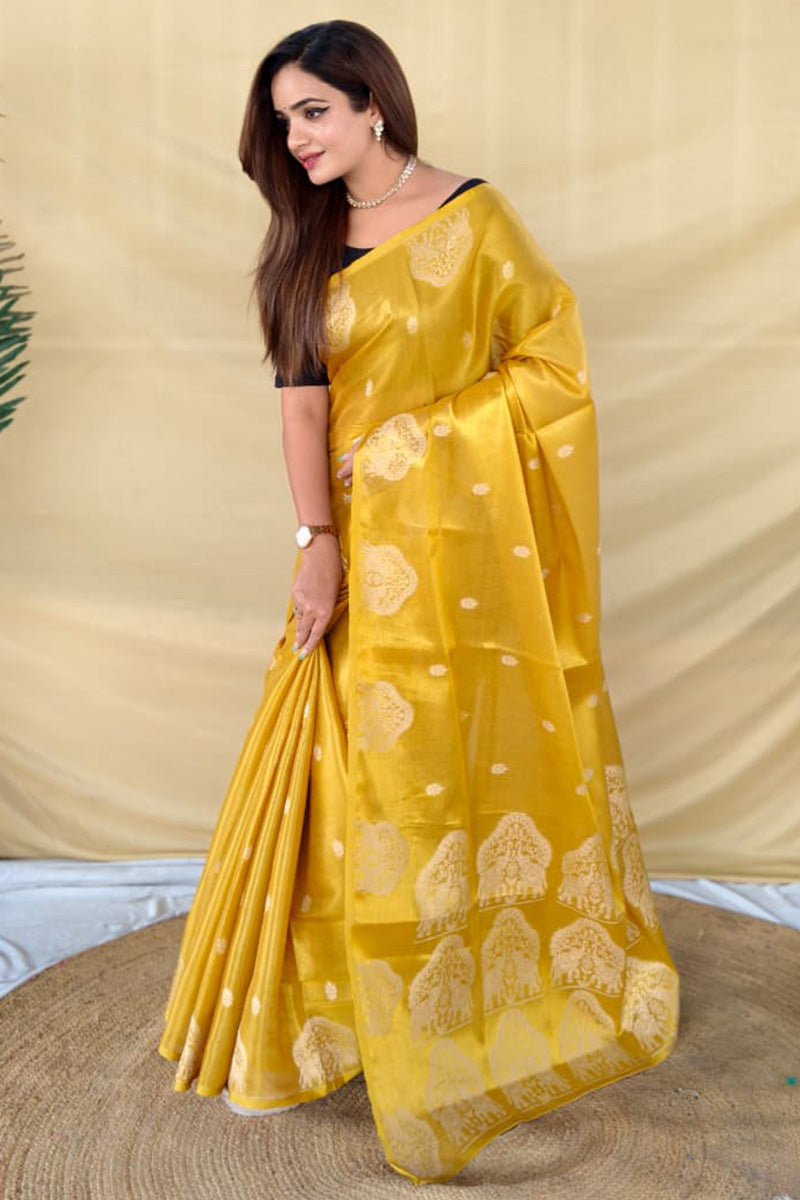 Alluring Yellow Banarasi Tissue Silk Saree With Energetic Blouse Piece