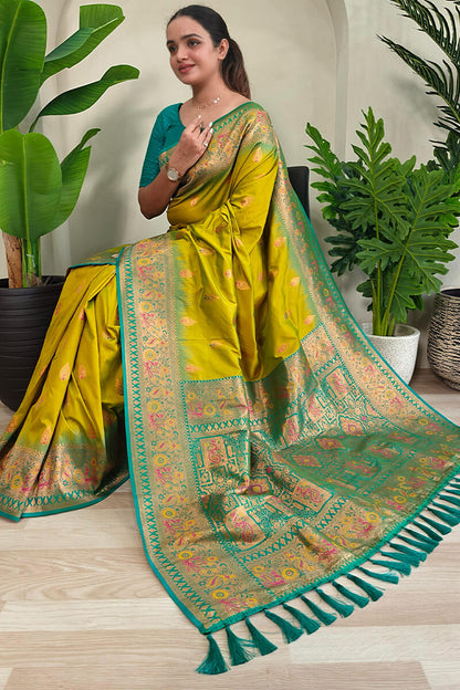 Cynosure Mehndi Soft Banarasi Silk Saree With Glowing Blouse Piece