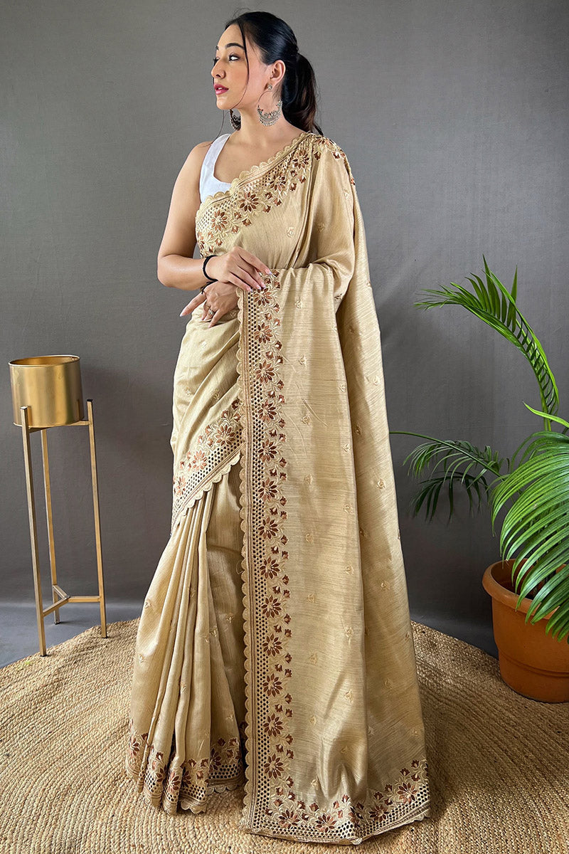 Snazzy Beige Embroidery Work Soft Silk Saree With Improbable Blouse Piece