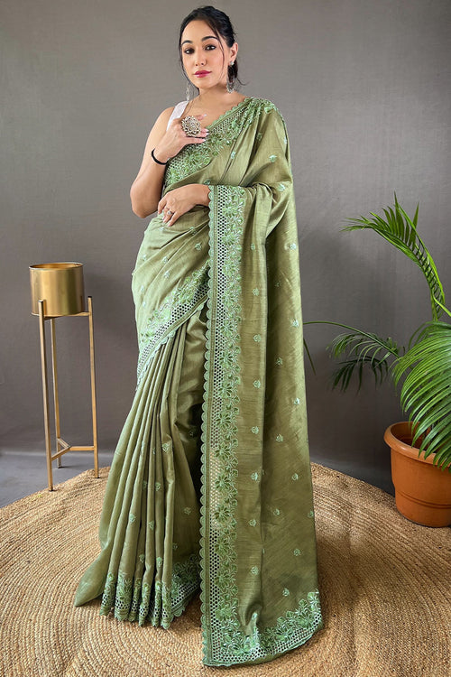 Load image into Gallery viewer, Staggering Green Embroidery Work Soft Silk Saree With Surreptitious Blouse Piece
