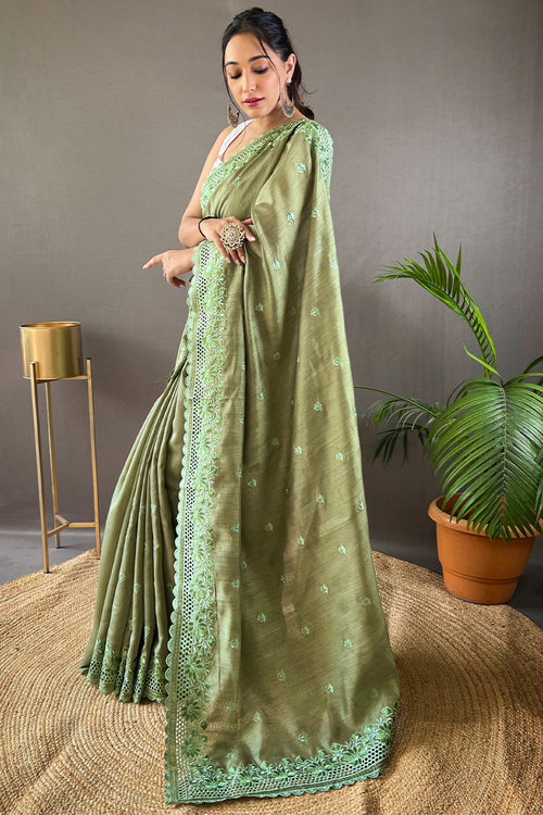 Load image into Gallery viewer, Staggering Green Embroidery Work Soft Silk Saree With Surreptitious Blouse Piece
