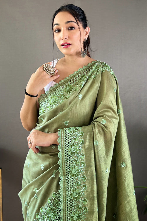 Load image into Gallery viewer, Staggering Green Embroidery Work Soft Silk Saree With Surreptitious Blouse Piece
