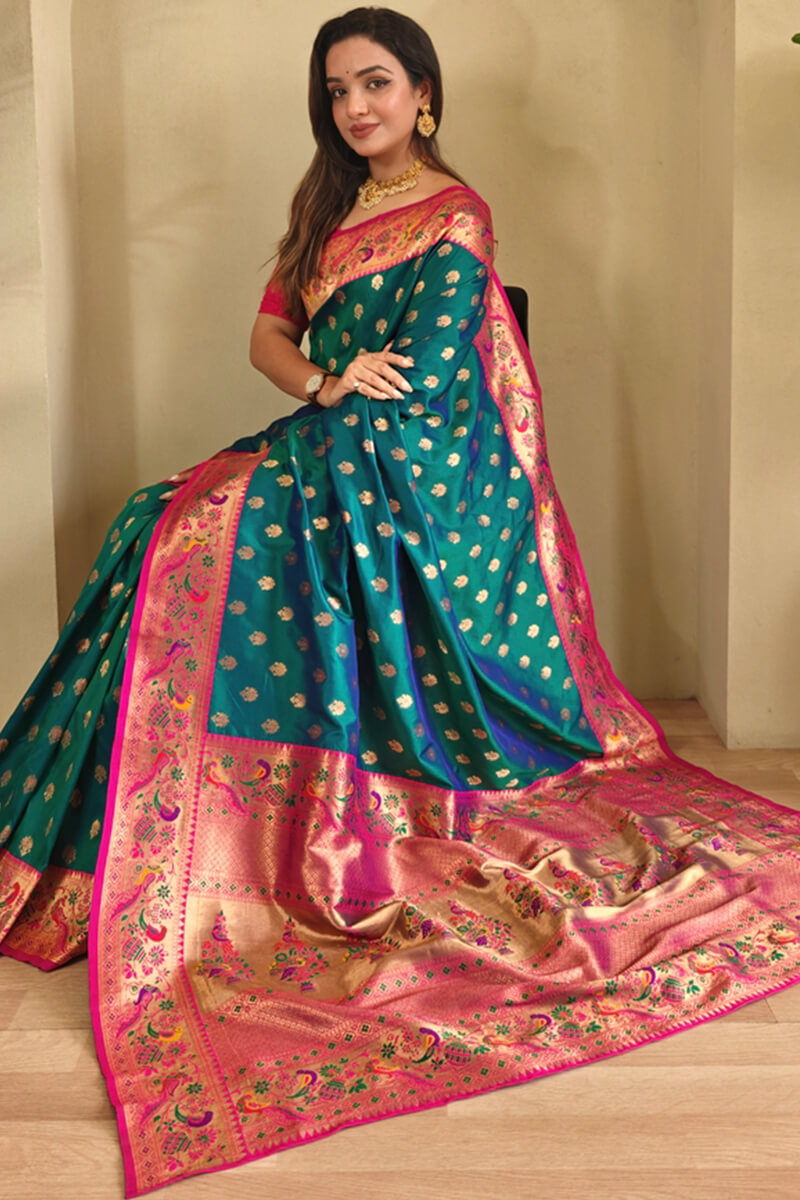 Engaging Rama Paithani Silk Saree With Glowing Blouse Piece