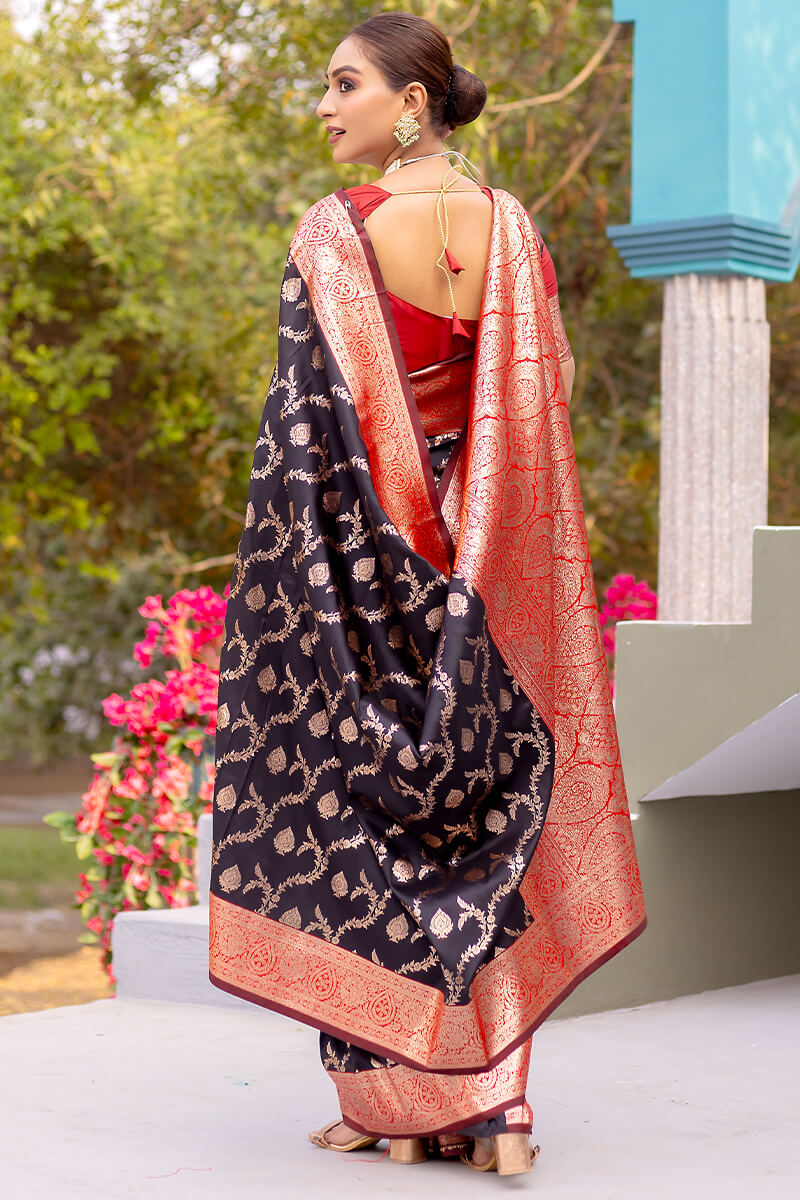 Desirable Black Soft Banarasi Silk Saree With Mesmeric Blouse Piece