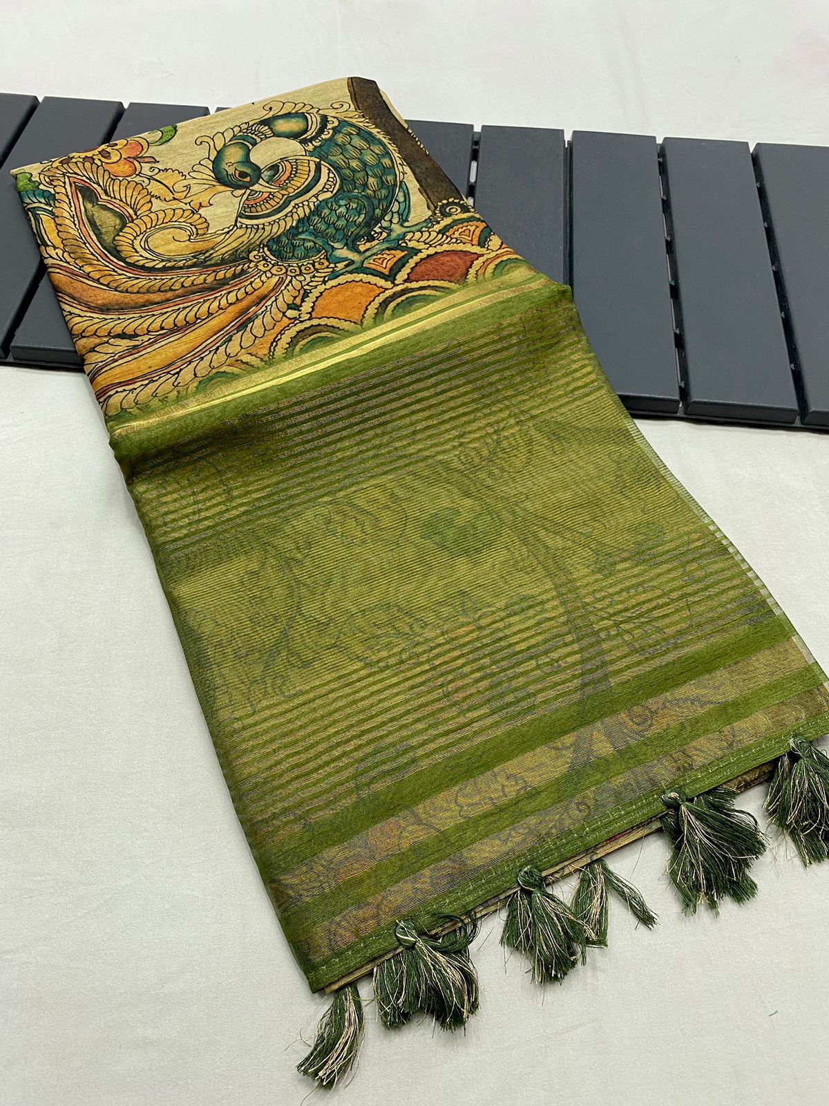 Precious Green Kalamkari Printed Saree With Innovative Blouse Piece