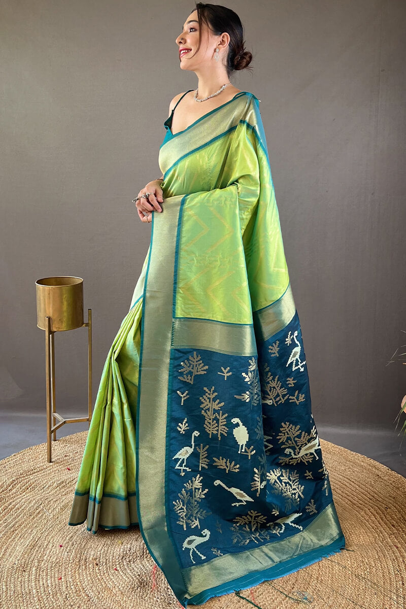 Majesty Parrot Soft Banarasi Silk Saree With Dulcet Blouse Piece