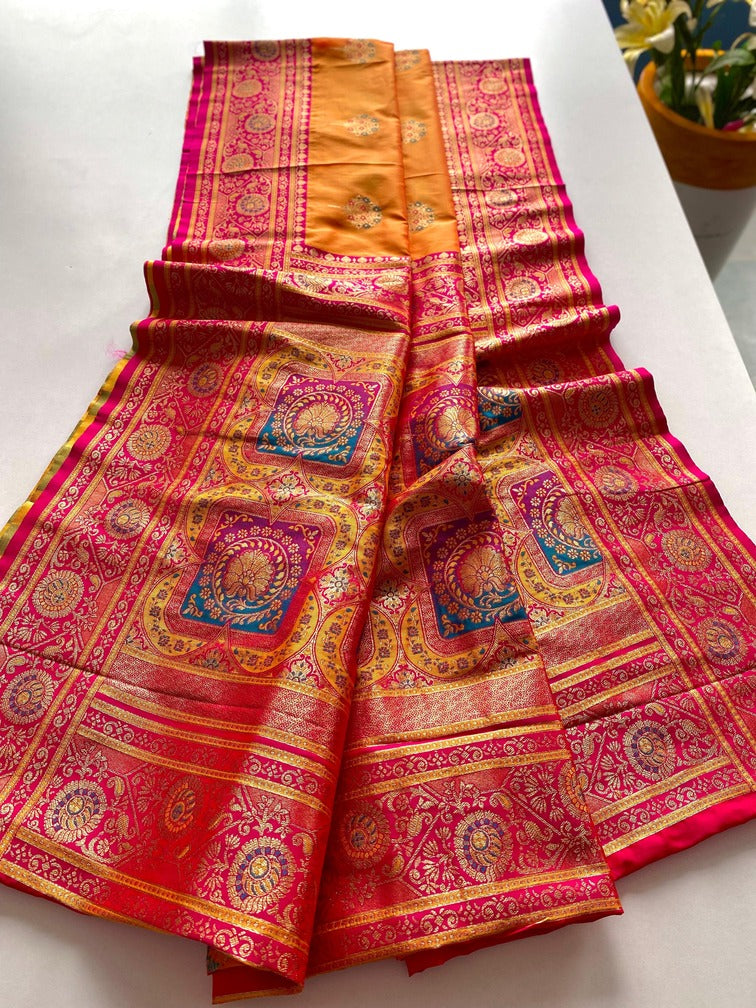 Eloquence Orange Soft Banarasi Silk Saree With Mellifluous Blouse Piece