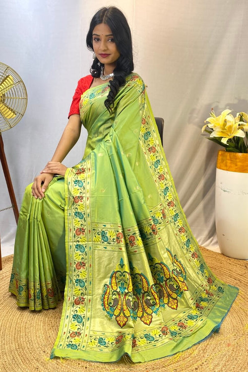 Load image into Gallery viewer, Scrumptious Parrot Paithani Silk Saree With Proficient Blouse Piece
