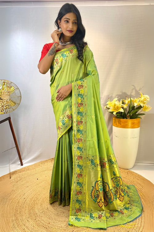 Load image into Gallery viewer, Scrumptious Parrot Paithani Silk Saree With Proficient Blouse Piece
