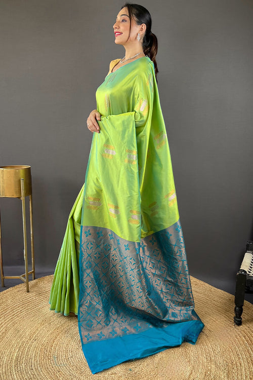 Load image into Gallery viewer, Prominent Parrot Soft Banarasi Silk Saree With Inspiring Blouse Piece
