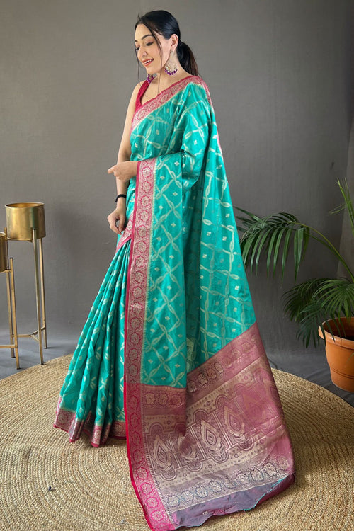 Load image into Gallery viewer, Desirable Turquoise Soft Banarasi Silk Saree With Hypnotic Blouse Piece
