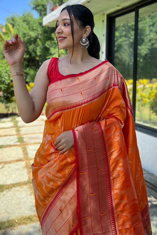 Load image into Gallery viewer, Deserving Orange Paithani Silk Saree With Skinny Blouse Piece
