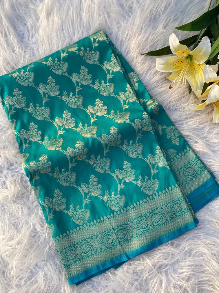 Girlish Rama Soft Banarasi Silk Saree With Blooming Blouse Piece