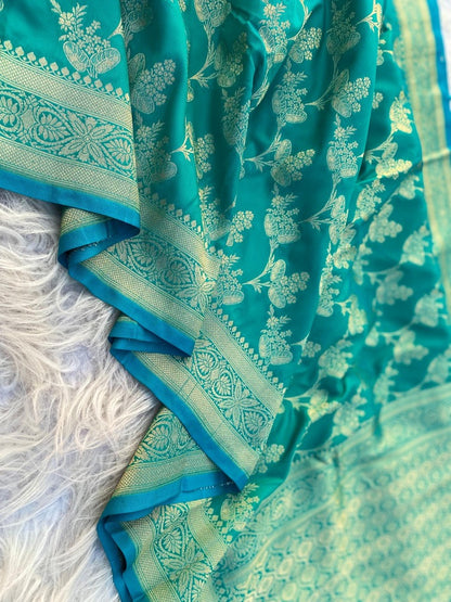 Girlish Rama Soft Banarasi Silk Saree With Blooming Blouse Piece