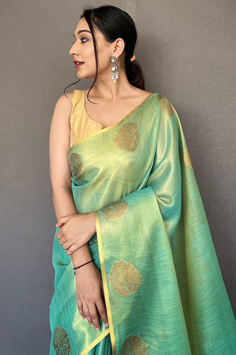 Grandiose Turquoise Soft Banarasi Tissue Silk Saree With Verdant Blouse Piece