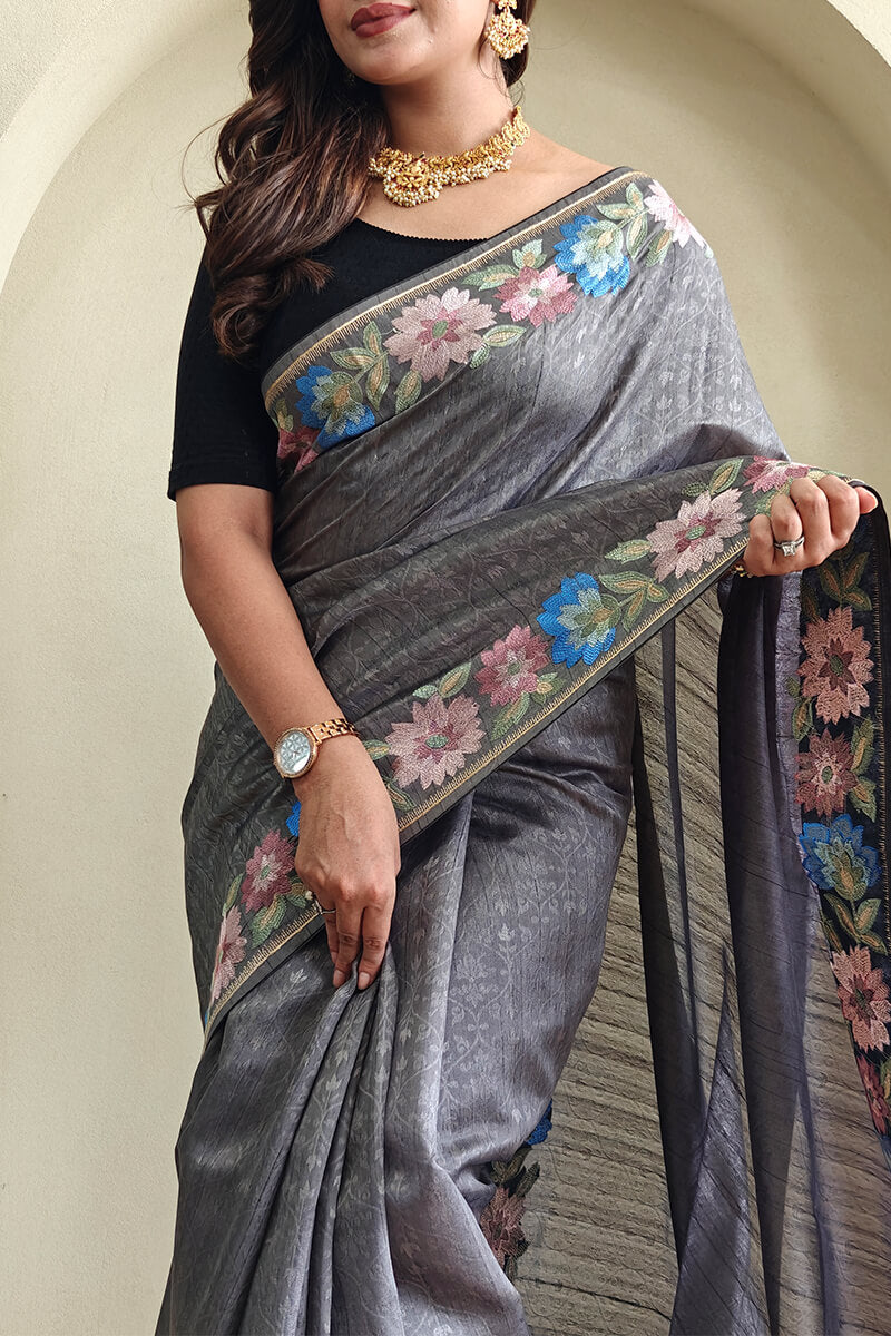 Sizzling Grey Embroidery Work Tussar Silk Saree With Enticing Blouse Piece