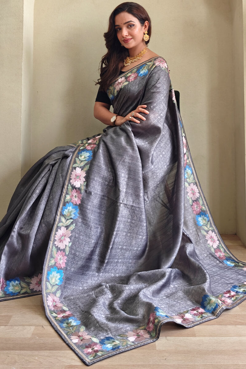 Sizzling Grey Embroidery Work Tussar Silk Saree With Enticing Blouse Piece