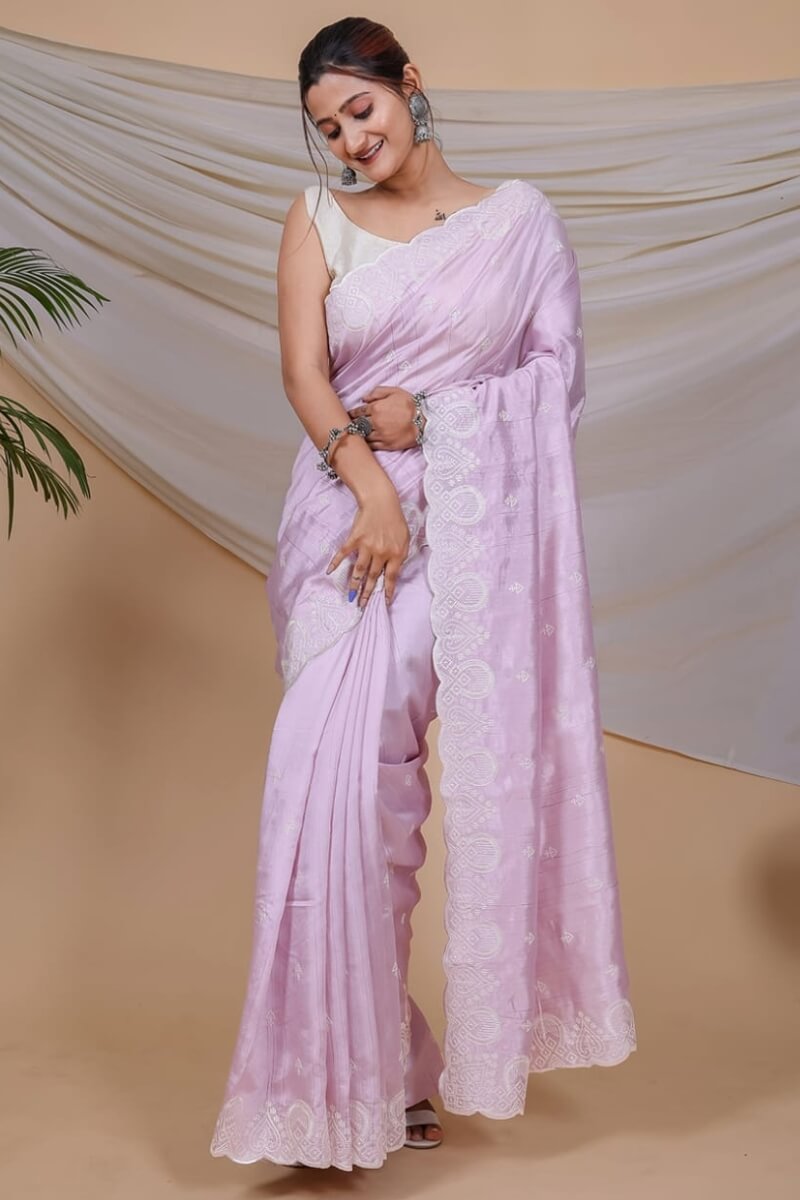 Mesmerising Lavender Embroidery Work Soft Silk Saree With Adorning Blouse Piece