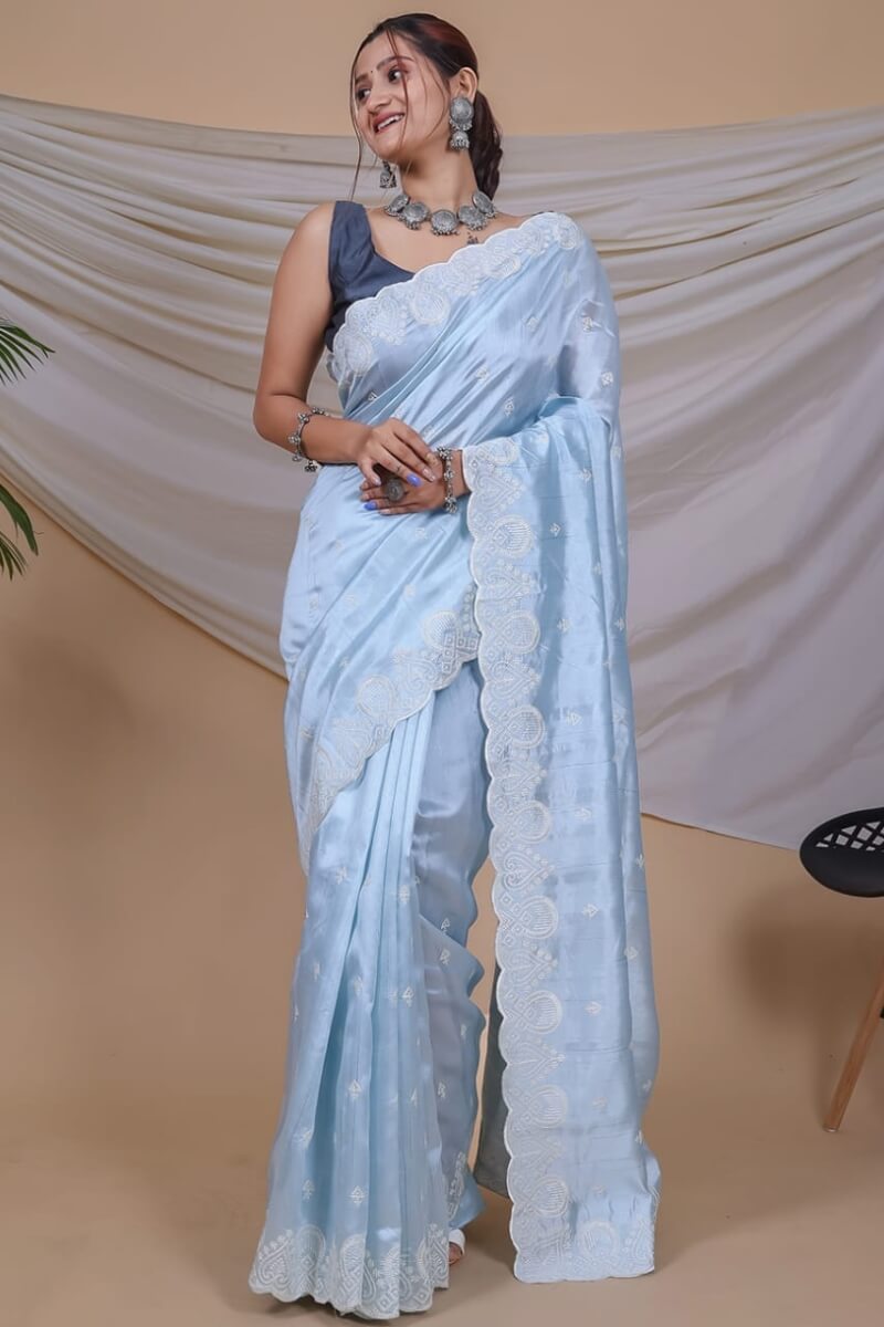 Prominent Sky Embroidery Work Soft Silk Saree With Inspiring Blouse Piece