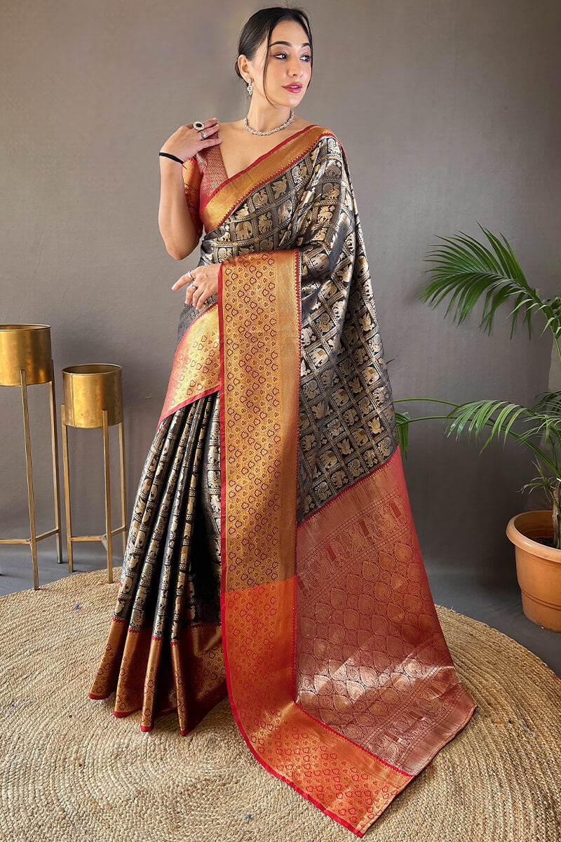 Skinny Black Kanjivaram Silk Saree With Dazzling Blouse Piece