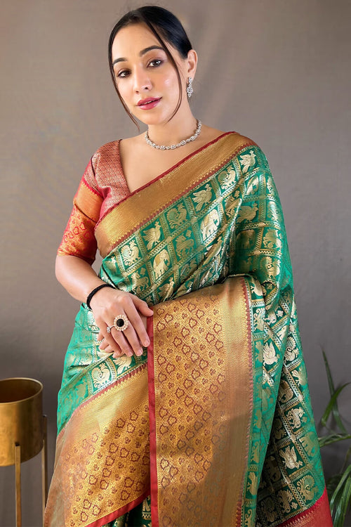 Load image into Gallery viewer, Invaluable Dark Green Kanjivaram Silk Saree With Demanding Blouse Piece
