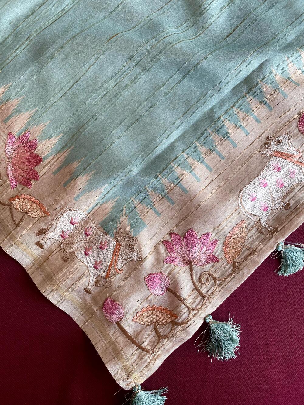 Fugacious Sea Green Embroidery Work Tussar Silk Saree With Invaluable Blouse Piece