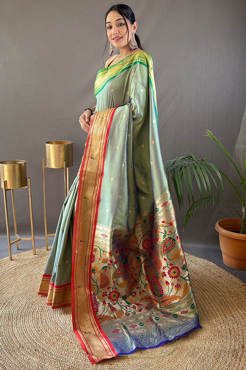 Twirling Pista Paithani Silk Saree With Exquisite Blouse Piece