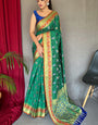 Delectable Green Patola Silk Saree with Propinquity Blouse Piece