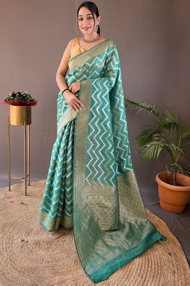 Outstanding Green Cotton Silk Saree With Capricious Blouse Piece