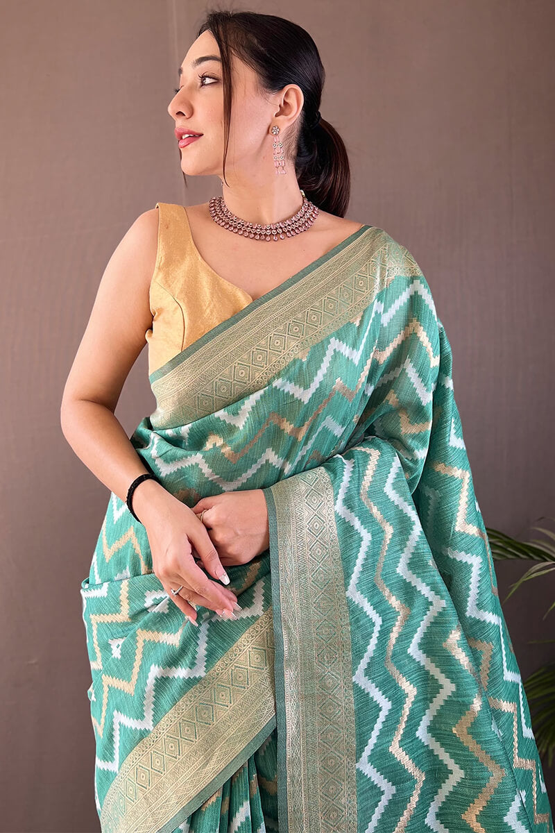 Outstanding Green Cotton Silk Saree With Capricious Blouse Piece