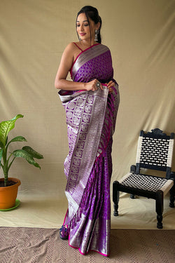 Tempting Purple Soft Banarasi Silk Saree With Engaging Blouse Piece
