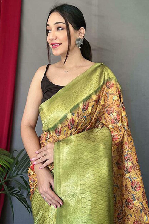 Load image into Gallery viewer, Nectarous Mustard Kalamkari Printed Saree With Alluring Blouse Piece
