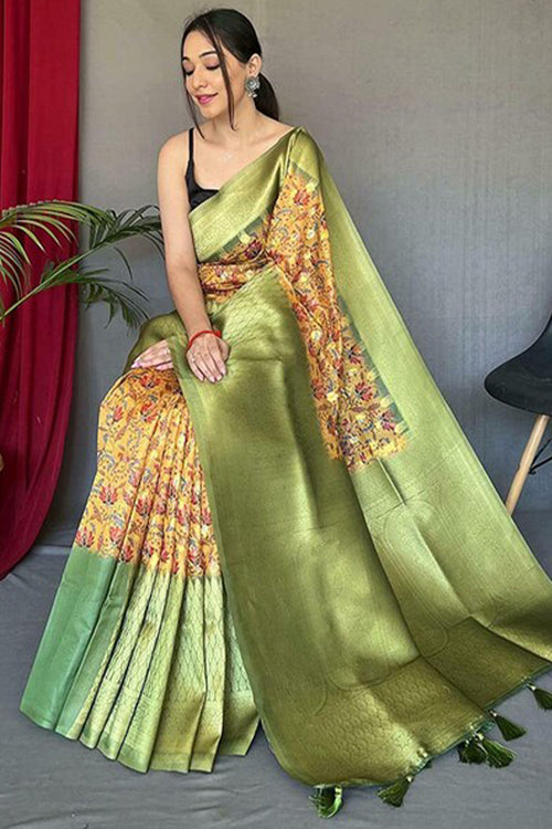 Load image into Gallery viewer, Nectarous Mustard Kalamkari Printed Saree With Alluring Blouse Piece
