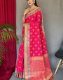 Sophisticated Dark Pink Patola Silk Saree with Capricious Blouse Piece