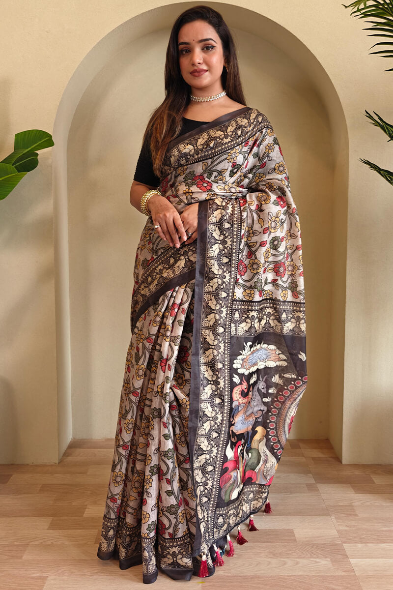 Scrumptious Off White Kalamkari Printed Saree With Scintillating Blouse Piece