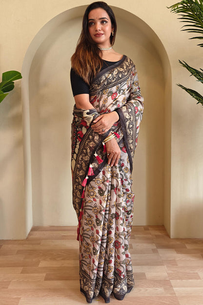 Scrumptious Off White Kalamkari Printed Saree With Scintillating Blouse Piece