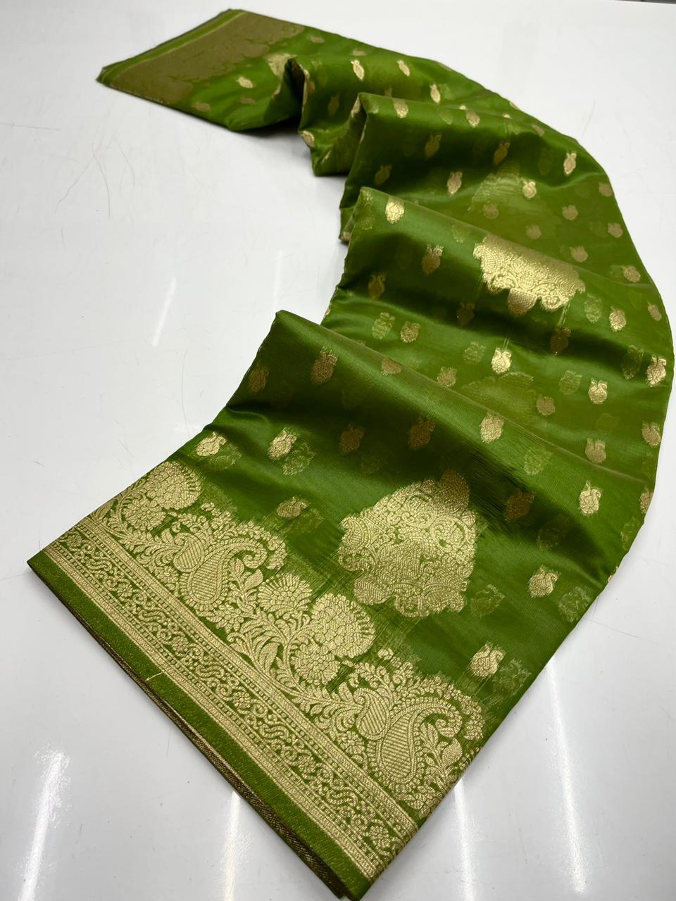 Beleaguer Green Organza Silk Saree With Delightful Blouse Piece