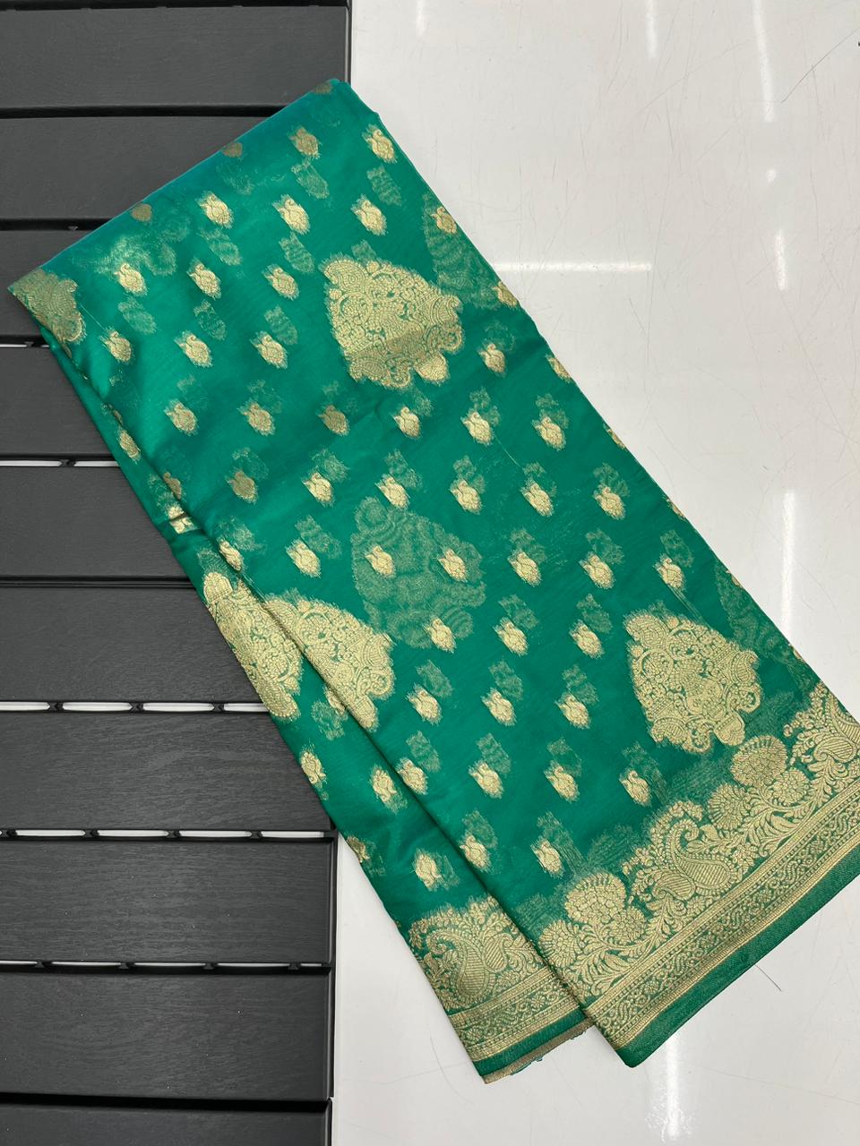 Fairytale Sea Green Organza Silk Saree With Radiant Blouse Piece