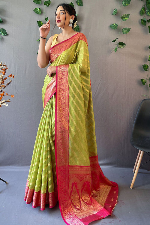 Load image into Gallery viewer, Cynosure Parrot Organza Silk Saree With Chatoyant Blouse Piece
