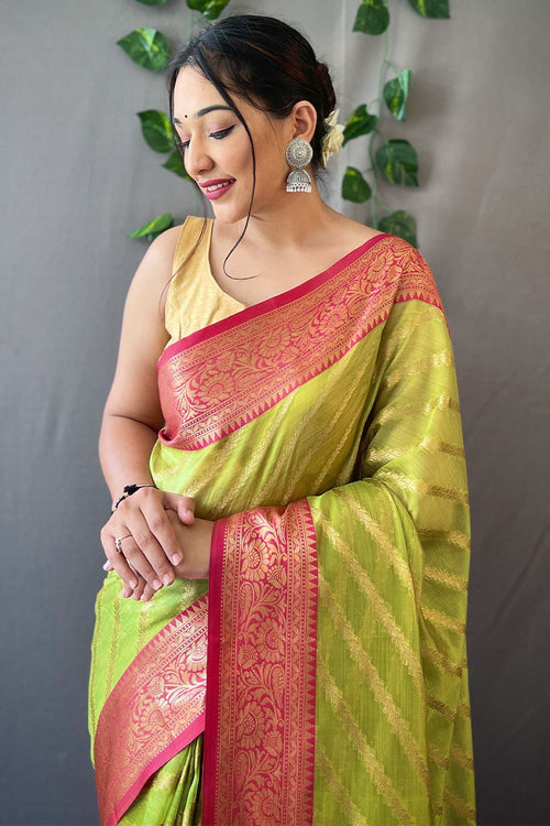 Load image into Gallery viewer, Cynosure Parrot Organza Silk Saree With Chatoyant Blouse Piece
