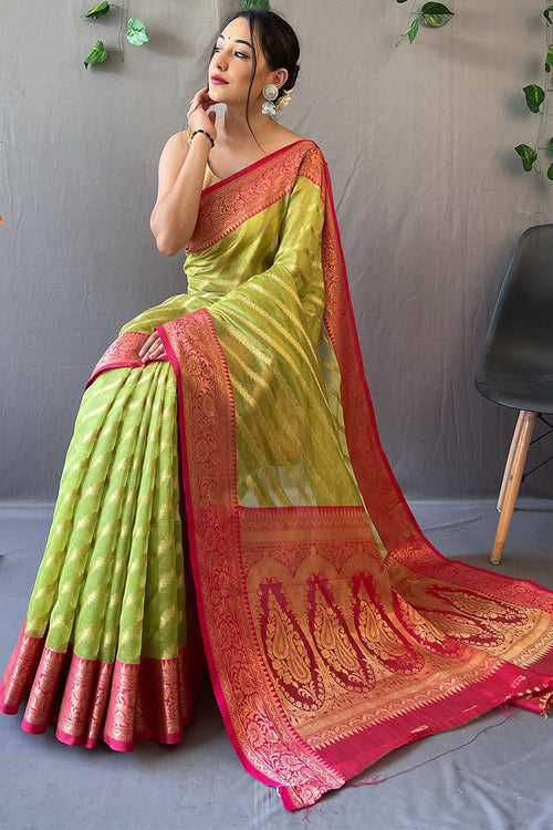 Load image into Gallery viewer, Cynosure Parrot Organza Silk Saree With Chatoyant Blouse Piece
