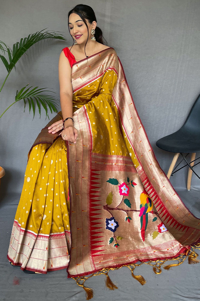 Cynosure Mustard Paithani Silk Saree With Embrocation Blouse Piece