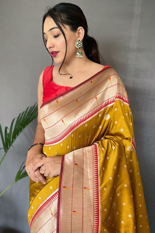 Load image into Gallery viewer, Cynosure Mustard Paithani Silk Saree With Embrocation Blouse Piece
