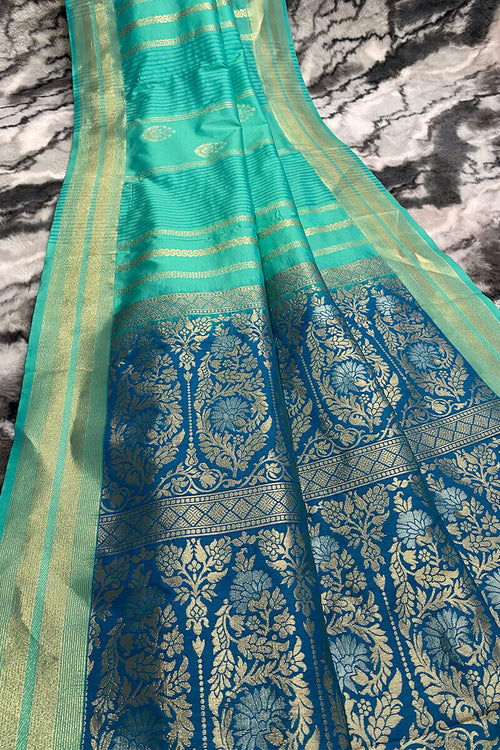 Load image into Gallery viewer, Demanding Turquoise Soft Banarasi Silk Saree With Smart Blouse Piece
