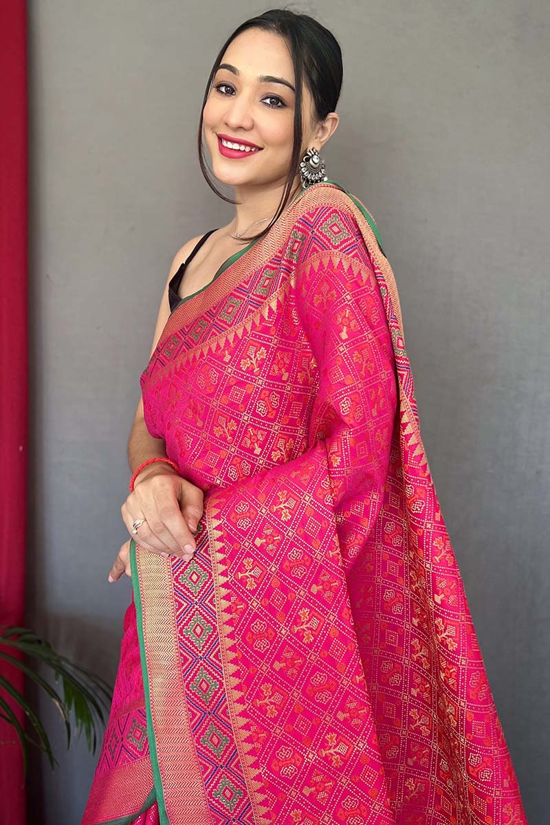 Traditional Dark Pink Patola Silk Saree with Ebullience Blouse Piece