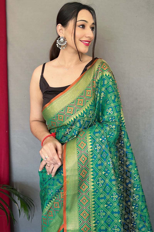 Load image into Gallery viewer, Lagniappe Green Patola Silk Saree with Petrichor Blouse Piece
