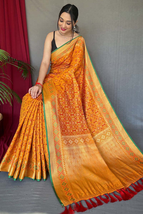 Load image into Gallery viewer, Susurrous Mustard Patola Silk Saree with Denouement Blouse Piece
