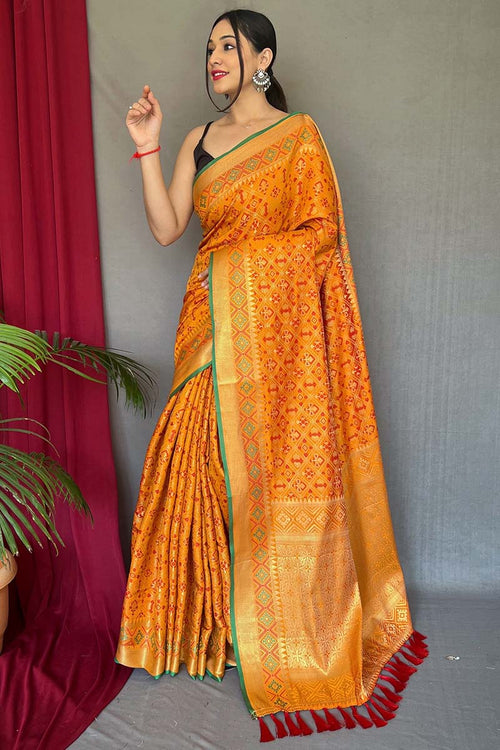 Load image into Gallery viewer, Susurrous Mustard Patola Silk Saree with Denouement Blouse Piece
